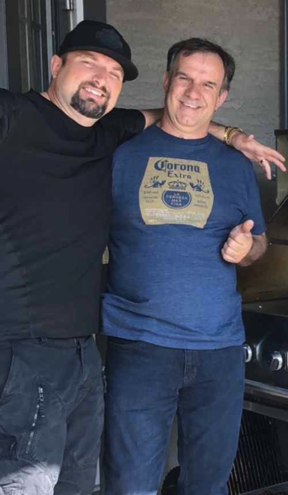 Danijel and a friend at the BBQ